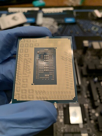 CPU contacts pre-install - somewhat uniform, somewhat not. Don't get scared now.